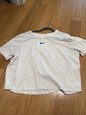Nike DRI FIT White Short-Sleeve Tennis Top with Black Swoosh